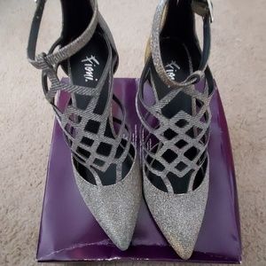 Sparkly silver heels with cute design